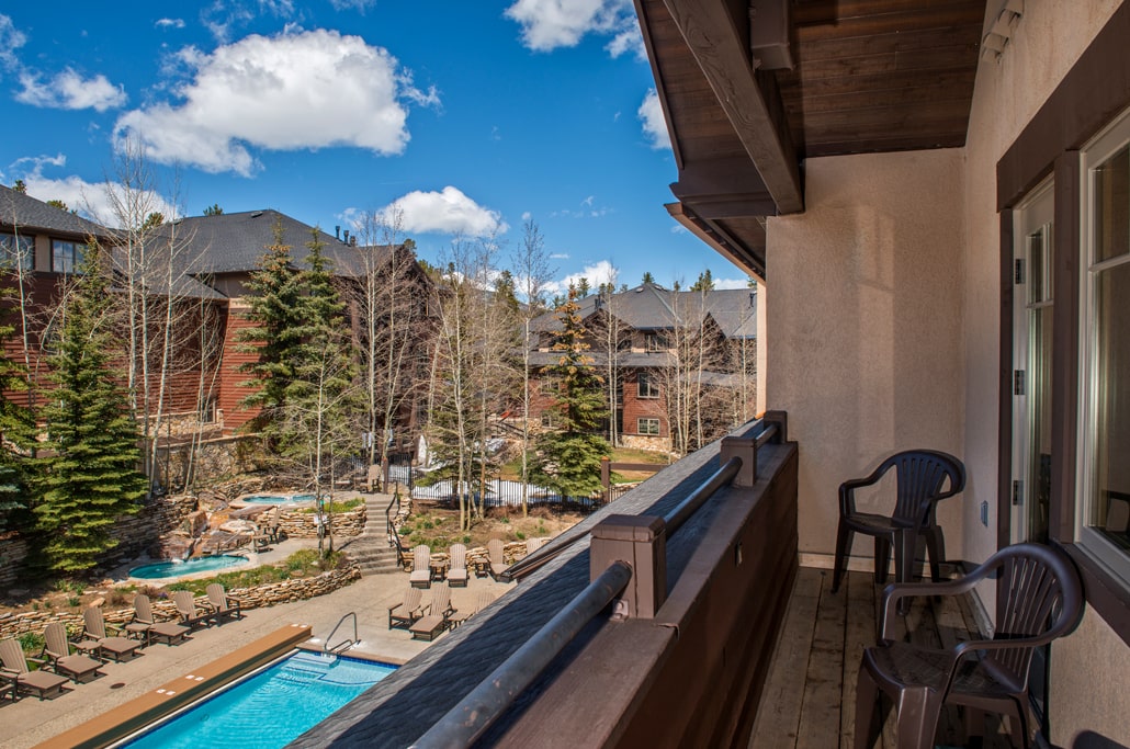 Balcony with views of pool and hot tubs