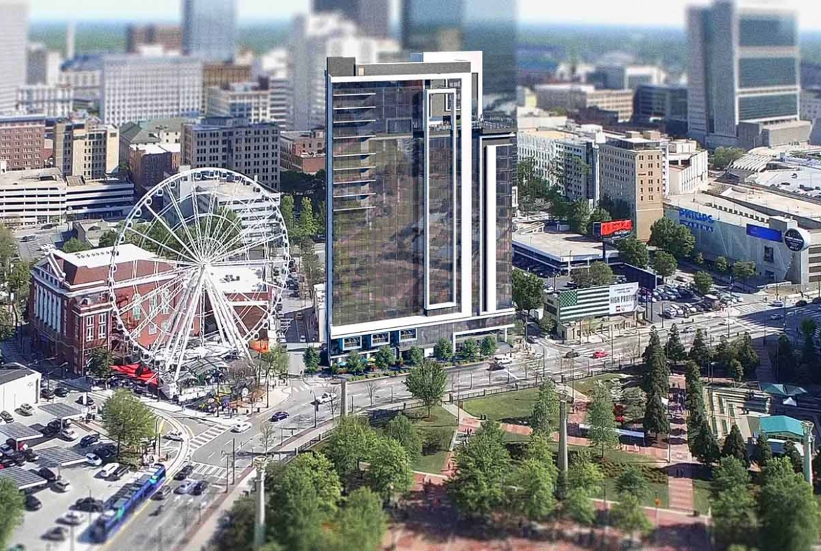 An aerial view of Downtown Atlanta with a ferris wheel near Club